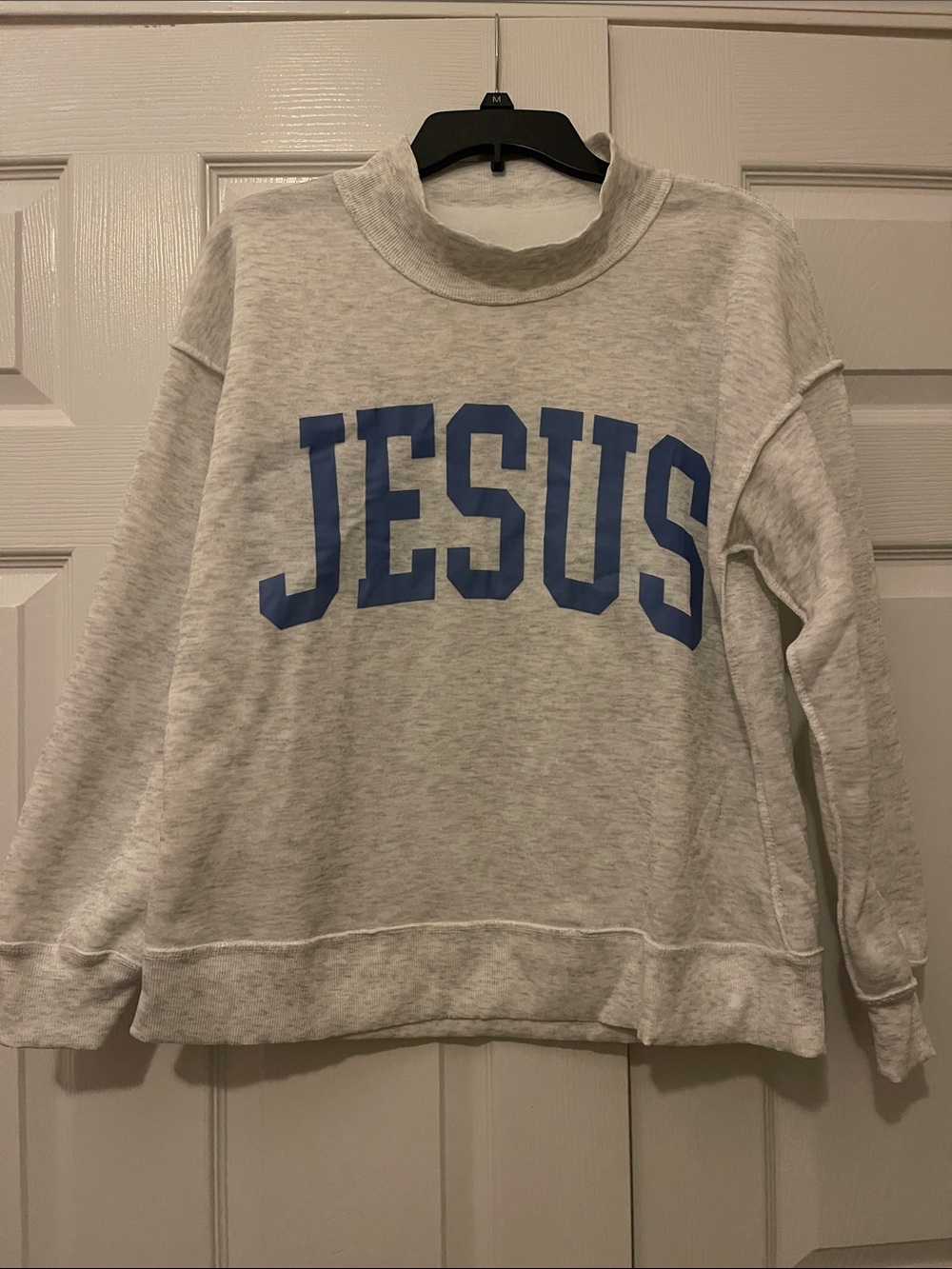 Gray Crewneck Sweatshirt with Blue JESUS Lettering
